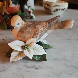 Elegant Bird Figurine with White and Brown Accents